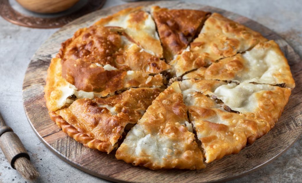 Crocante por fora, suculento por dentro: Gosh Naan – tarte de carne frita uigur