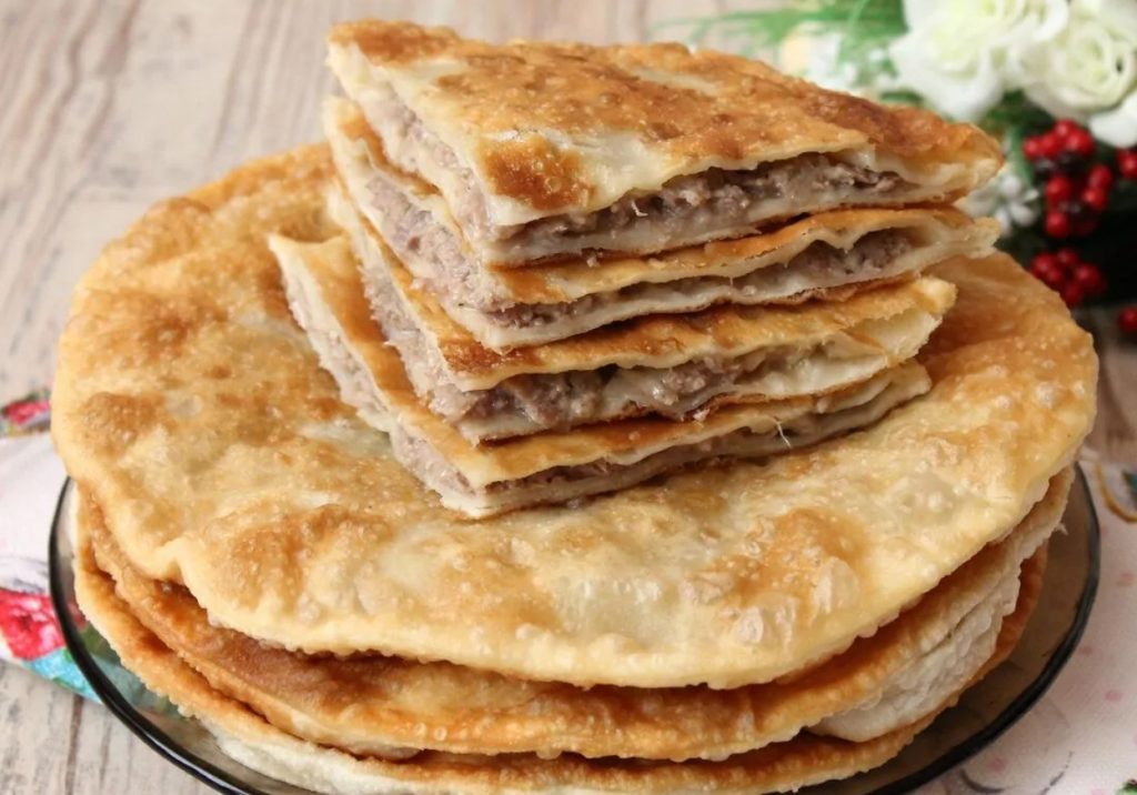 Crocante por fora, suculento por dentro: Gosh Naan – tarte de carne frita uigur